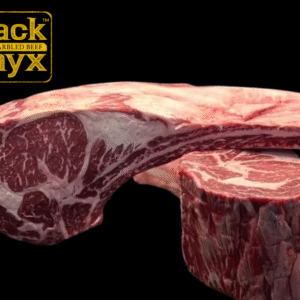 Tomahawk Black Onyx, corte premium de res con alto marmoleo, ideal para parrilladas gourmet.
